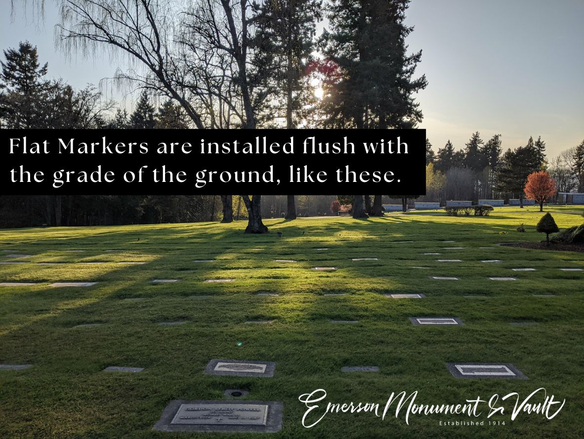 Emerson Monument Company Image of a cemetery with flat markers that are installed flush with the grade of the ground.